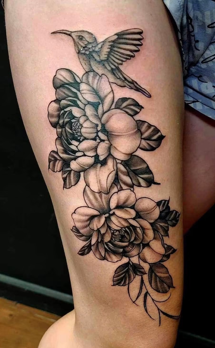 Hummingbird and floral tattoo after tattooing